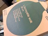 a box that is sitting on top of a table tennis racket