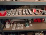 a shelf full of assorted items in a room