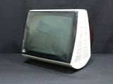 a small television sitting on top of a black table