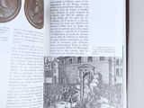a book with a picture of a man and a coin on it