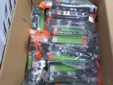 a lot of batteries in a cardboard box on the floor