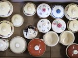 many bowls and cups in a box on the table