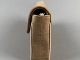 an image of a close up of a small bag with a ring inside of it