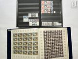 a book with stamps on it sitting on top of a table