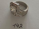 a ring that is sitting on top of a piece of paper