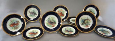 a lot of plates that are sitting on a table