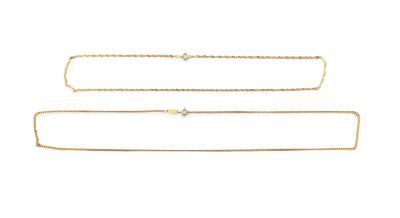 three different types of gold chains on a white background