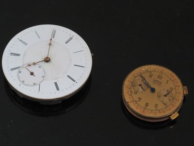 two different types of clocks on the table