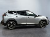 the new nissan kickstart suv is parked in a showroom