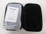 a black case with a white label and a black case with a white label and a black case with a white label and a black case with a white
