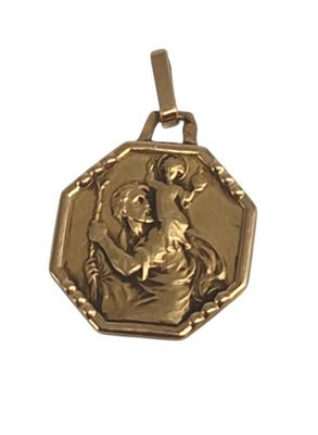 une image représentant une médaille d'or sur laquelle figure Jésus