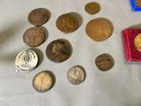 a lot of coins that are on a table