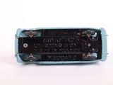 a close up of a small electronic device on a white surface