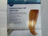 a box of microdry memory foam bath mats