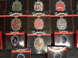 a lot of brooches on display on a table
