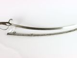 pair of silver plated swords on a white surface with a white background