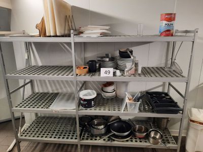 a metal shelf with pots and pans on top of it