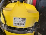 a yellow machine that is sitting on a table