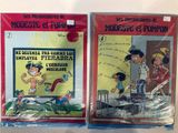 deux livres exposés sur la table