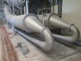 a large exhaust pipe in the middle of a room