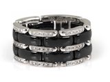 an image of a black and white diamond ring on a white background