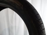 a close up of a tire tire on a white surface
