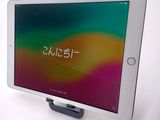 an image of a tablet computer sitting on top of a white table