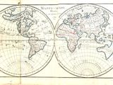 Une vieille carte du monde est représentée sur une feuille de papier