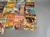 a lot of comic books on the table
