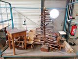 une photo d'un sapin de Noël en bois fait de brindilles