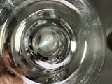 a close up of a glass of water on a table