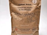 a brown bag with clothes hanging on a clothes line