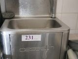 a stainless steel sink with a faucet on the side of it