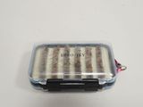 a small plastic box with several different types of food in it