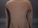 the back of a brown jacket on a mannequin mannequin mannequin mannequin mannequin mannequin mannequin mannequin