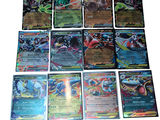 beaucoup de cartes pokemon sur la table