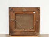an old wooden picture frame with a wire hanging from it ' s sides