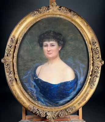 portrait of a woman in a blue dress in a gold frame