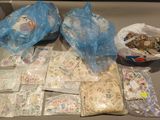 many bags of stamps on a table with a bag of stamps