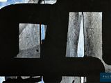 a black and white painting on a piece of paper
