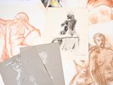 many different colored drawings of people on a table