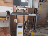 an image of a machine that is sitting in a garage