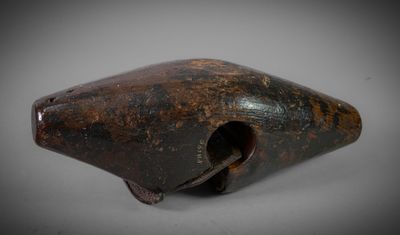 a close up of a metal object with a hole in it
