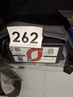 a bag with a price tag on it sitting on a shelf