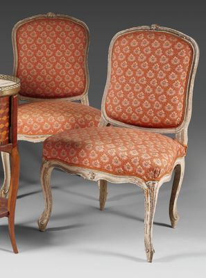 pair of louis xv style chairs and a side table