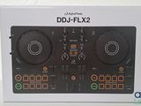 the box of the dj - flx2 is open and ready to be used