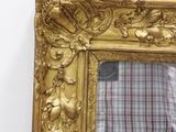 a man taking a picture of himself in a mirror