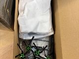 a box with a pair of glasses and a pair of scissors in it