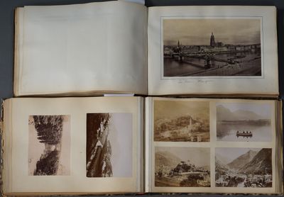 an open book with pictures of people and buildings on it
