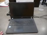 a laptop computer that is sitting on a table